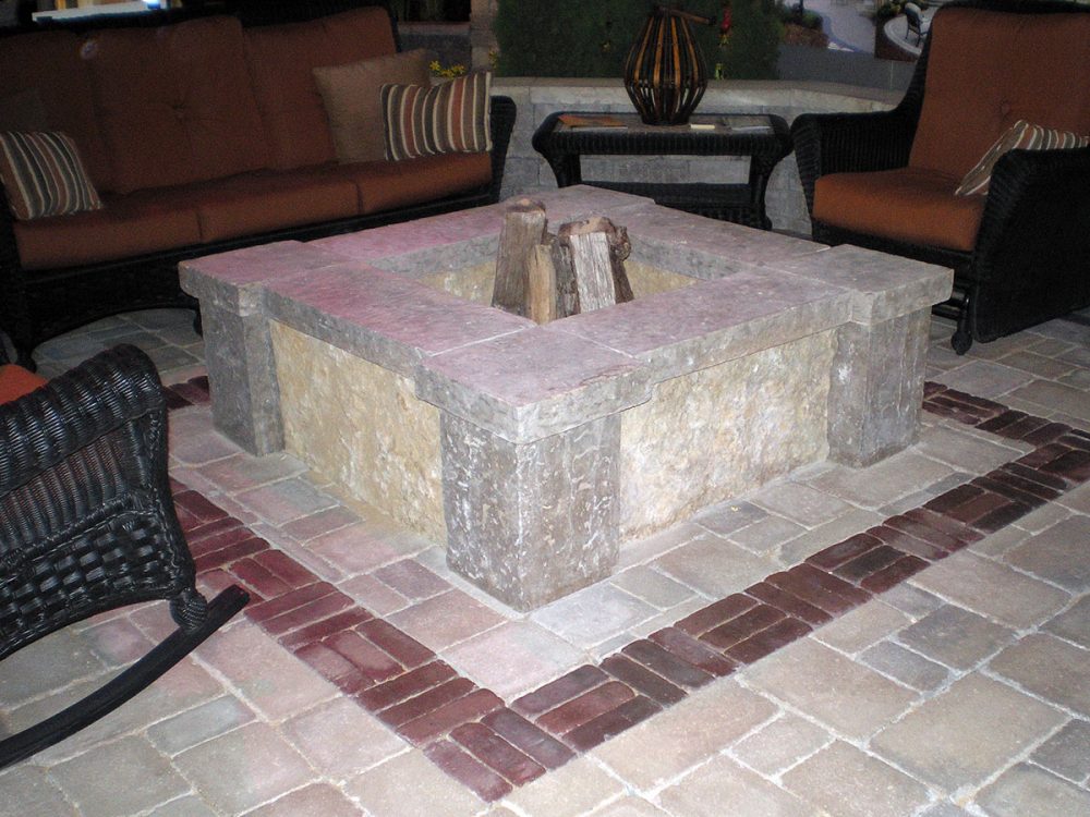 Rustic grey gold square fire pit with corner bump-outs