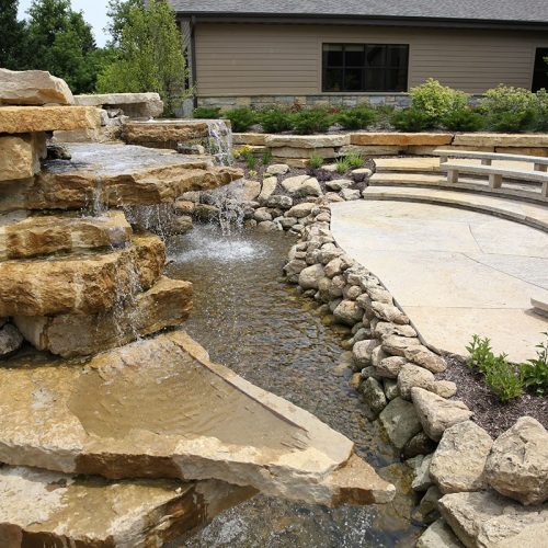 Rustic gold lannon splitface water feature